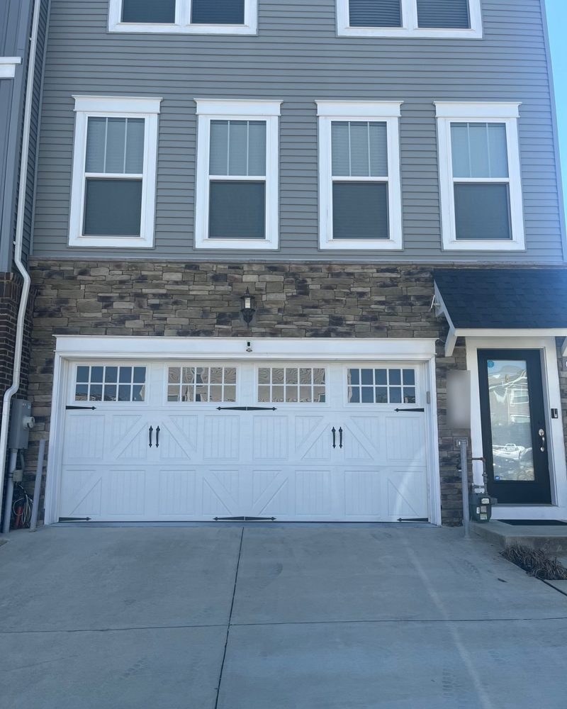A new townhome in Hanover with a stone front and a two-car garage