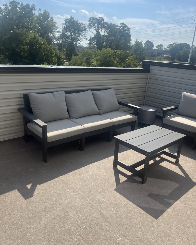 A furnished rooftop deck on a new townhome