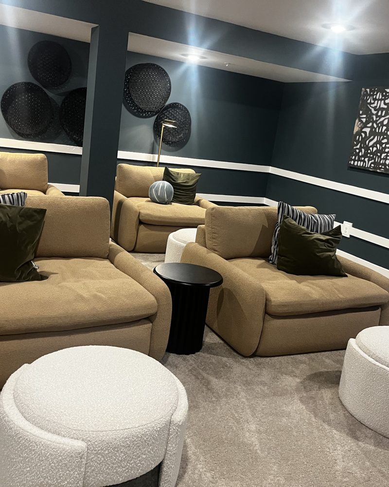 A finished lower level set up as a lounge in a new single-family home